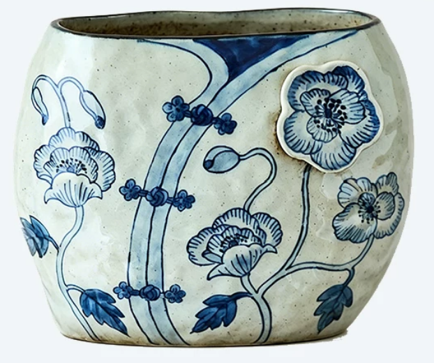 Poppy Relief Jar — round-bellied ceramic with 3D applied poppy blossom
