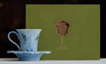 Hand-painted blue floral coffee cup and saucer with gift box