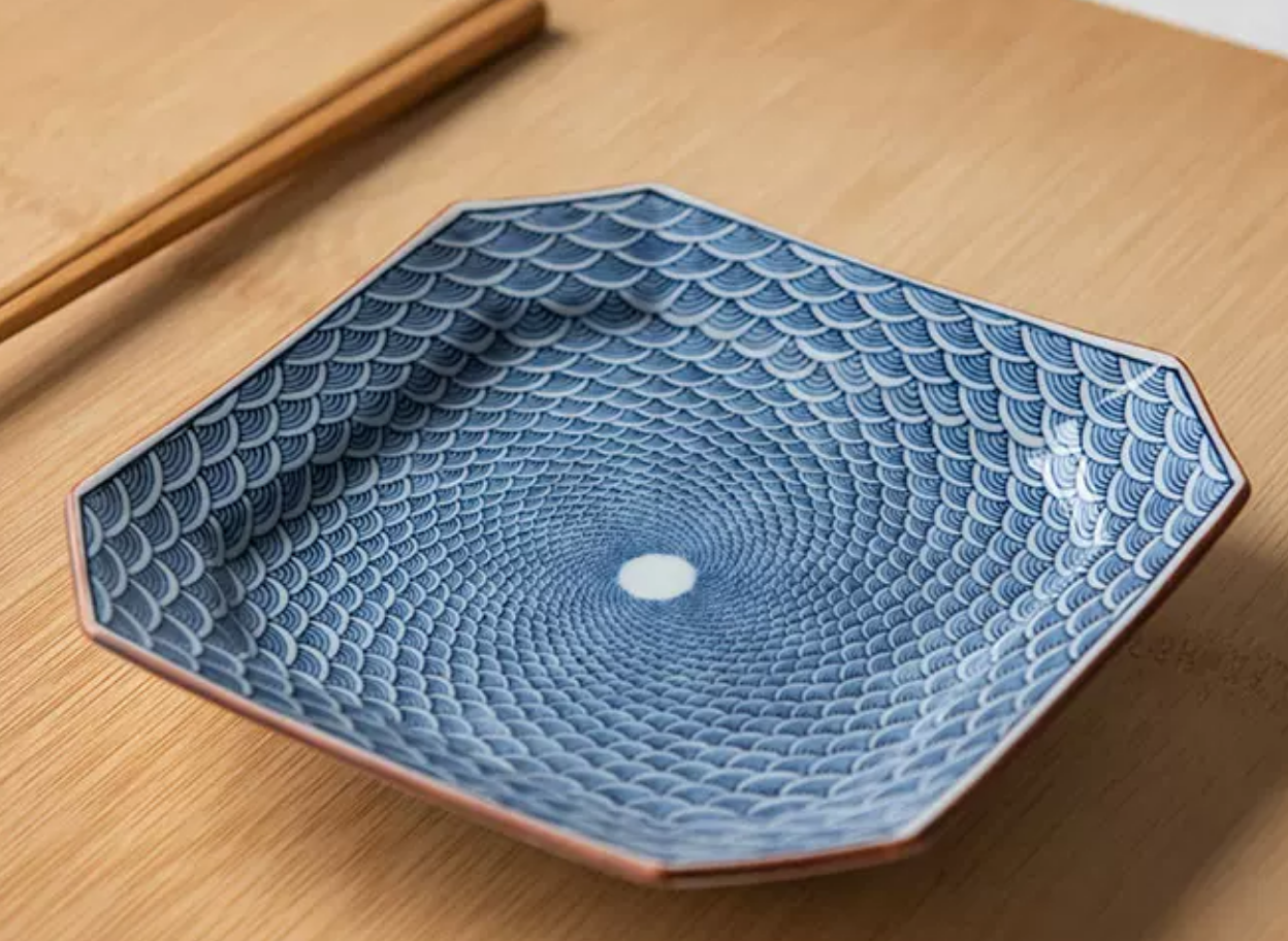 Blue and white porcelain footed dish with Japanese sweet and tea bowl