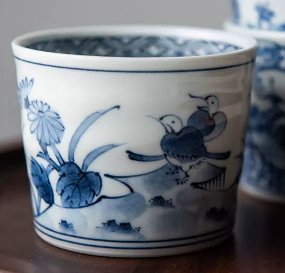 Close-up of Hasami blue and white porcelain dragonfly pattern plate